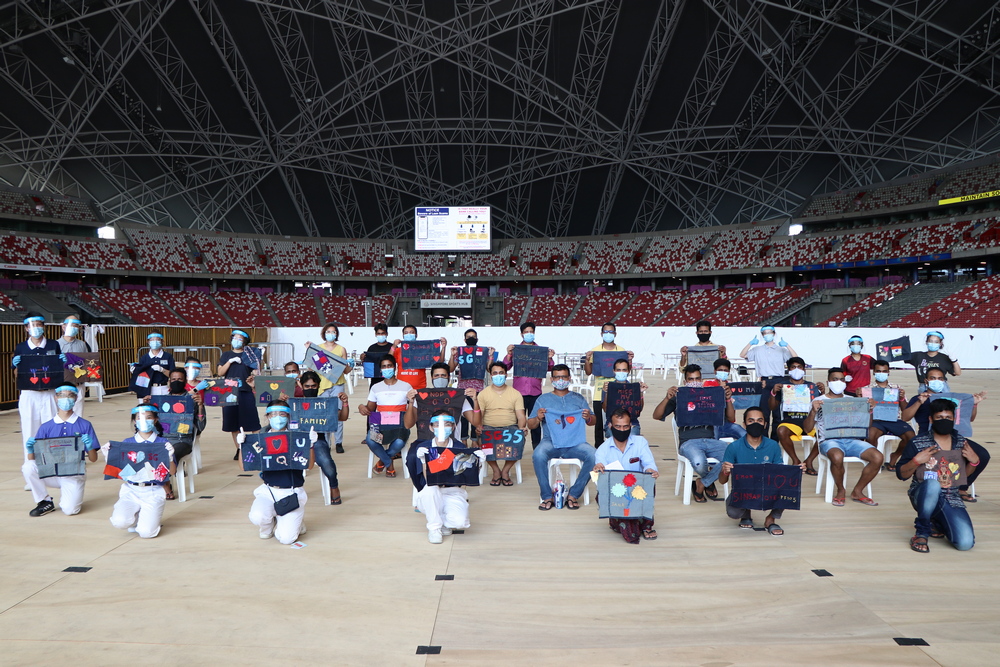 Migrant Workers Express their Appreciation to Singapore with Needle and Thread on National Day Eve